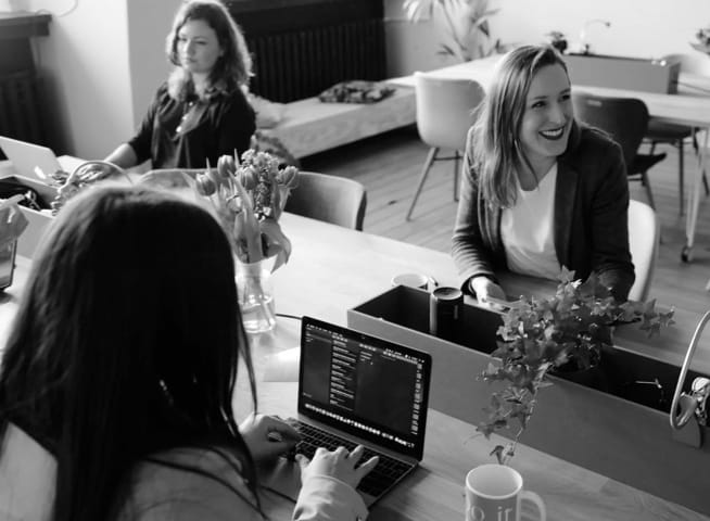 Three women working in office